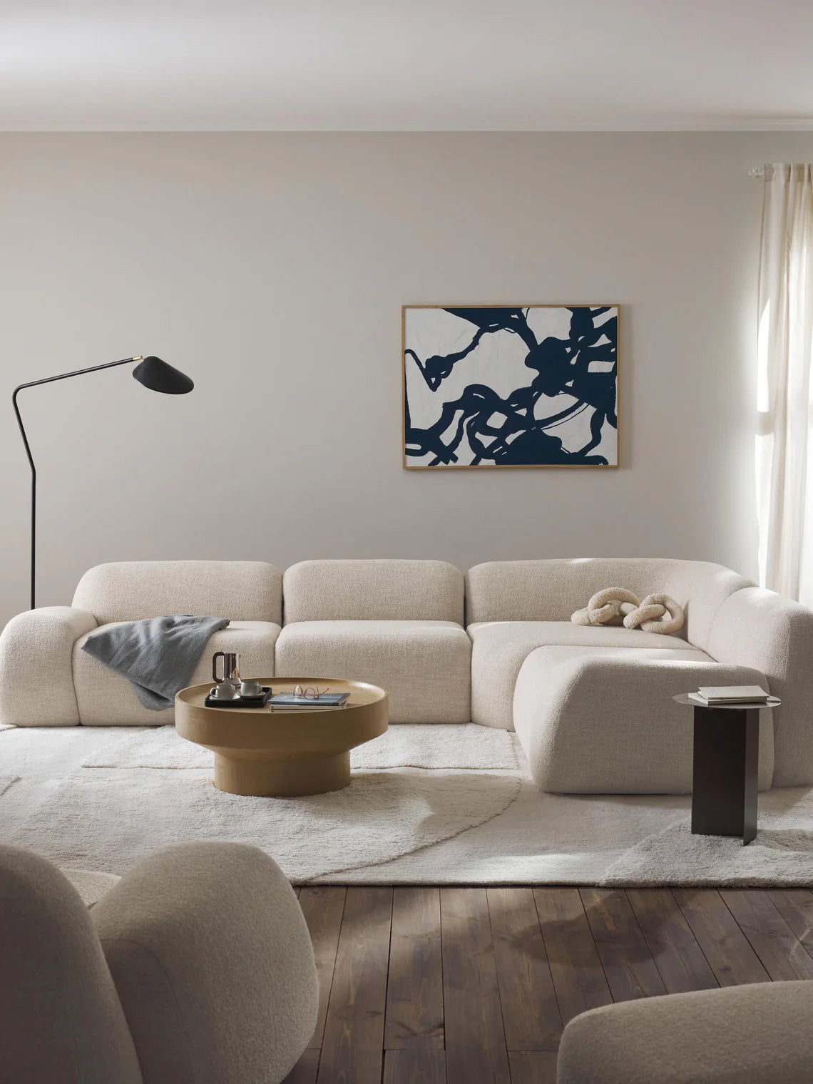 Canapé d'angle modulable 4 places en bouclette Wolke