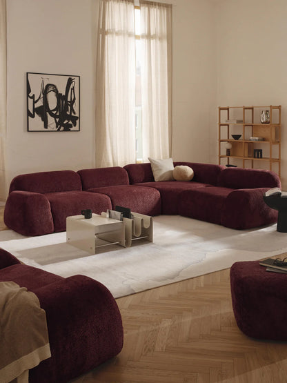 Canapé d'angle modulable 4 places en bouclette Wolke